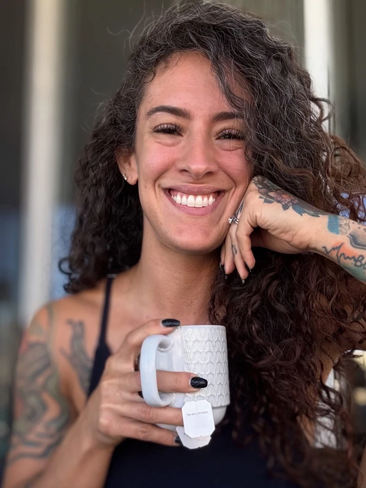 Alecia Achuff, smiling warmly